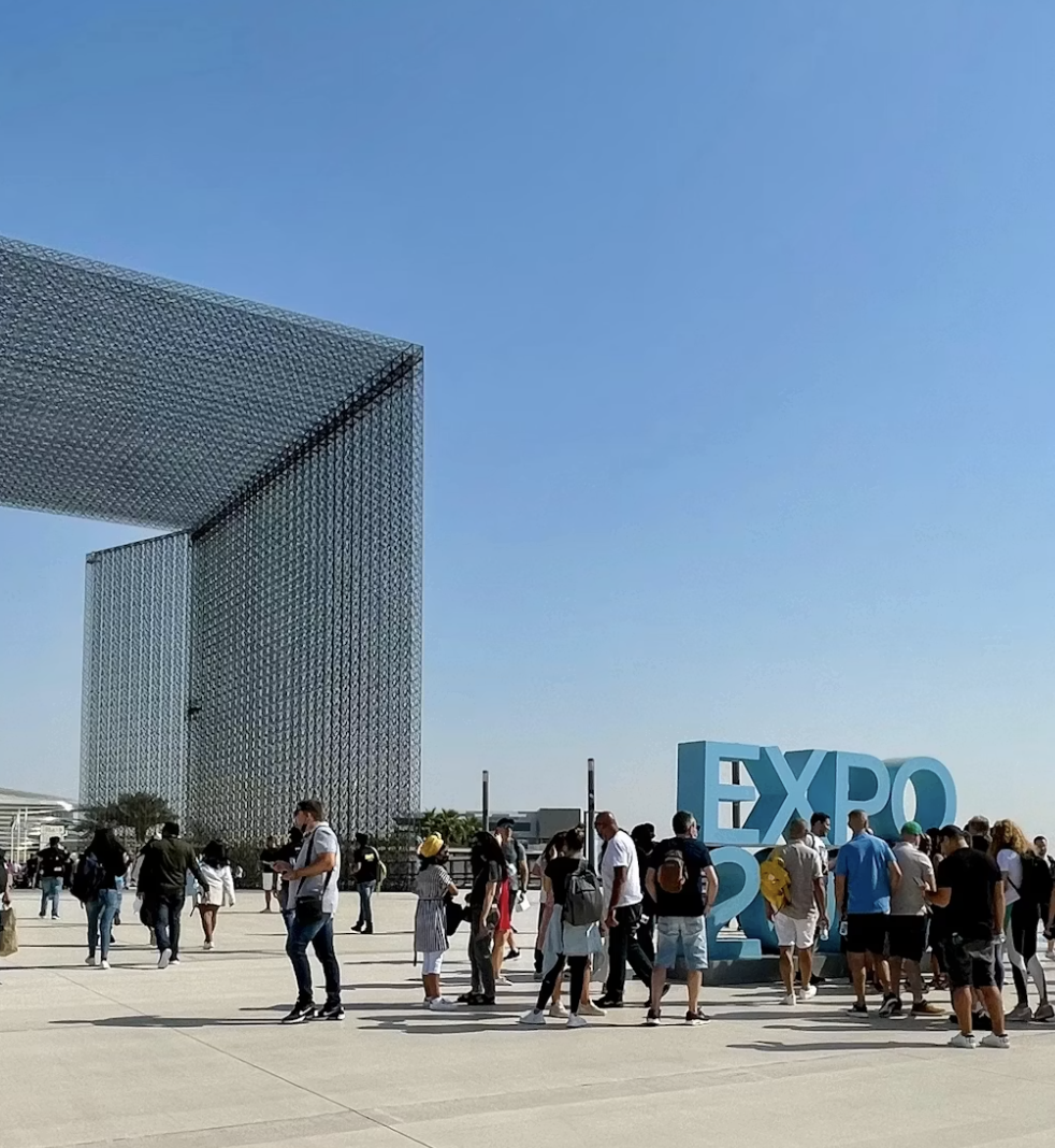 Attendees at large-scale expo pavilion